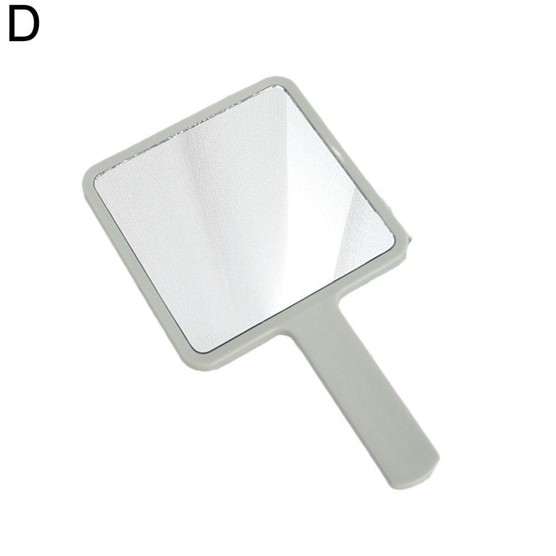 Mini square travel mirror with handle, perfect for travel and personal use.
